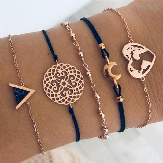 5-teiliges Armbandset für Damen in Schwarz und Gold mit Stoffband, Mond, Weltkugel und dekorativen Anhängern