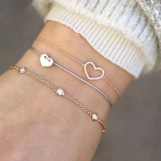 3-teiliges Armband Set für Damen mit Herzmotiven blauem Stoffband und goldfarbenen Details