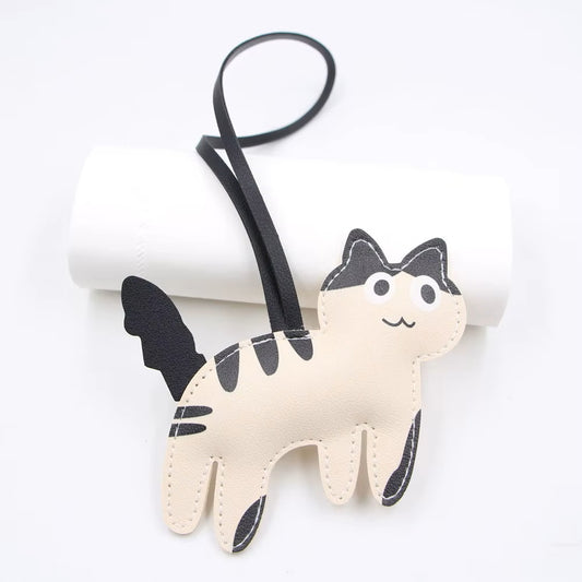Schlüsselanhänger Katze PU Leder schwarz-weiß/beige – Taschenanhänger
