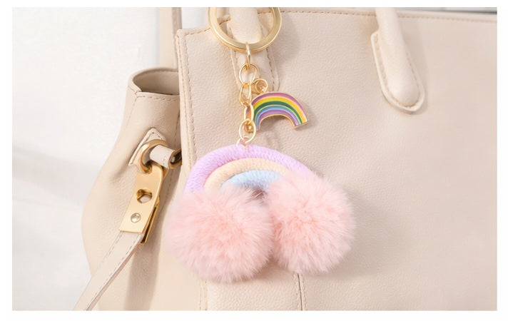 Regenbogen Schlüsselanhänger Pastell mit PomPoms als Taschenanhänger an Handtasche